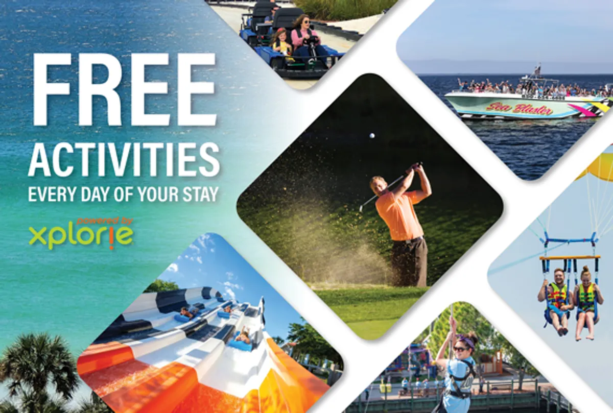 This vibrant exterior image captures a lively beach scene filled with families and friends enjoying a variety of activities. The image showcases people engaging in beach sports, boating, parasailing, and relaxing under the sun, evoking a sense of excitement and adventure. The clear blue sky and inviting waters highlight the area’s natural beauty and recreational opportunities.